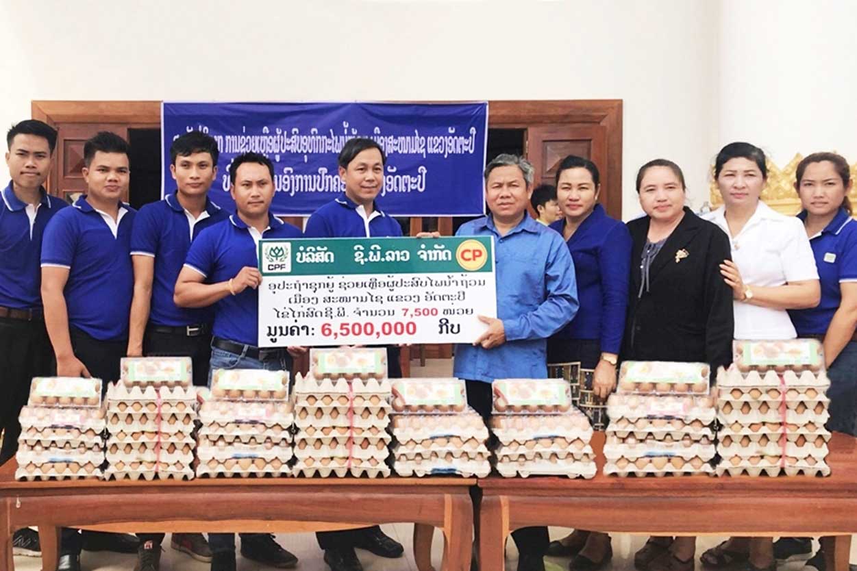 C.P. Laos donates funds and reliefs to flood victims in Laos 
